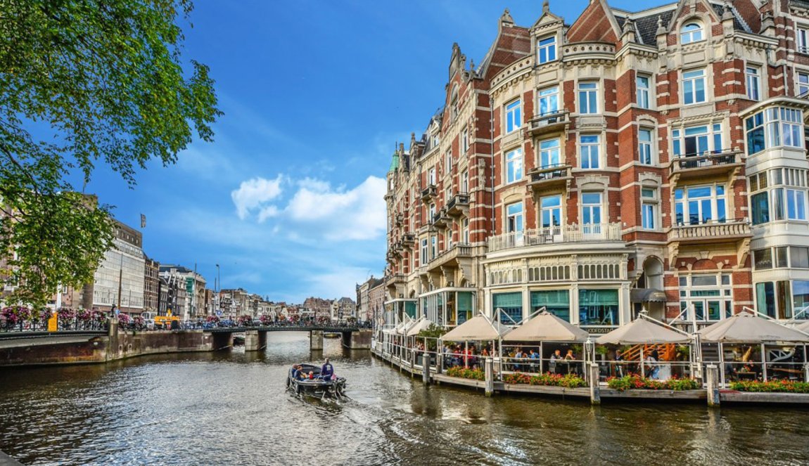 Boat on canal in Amsterdam