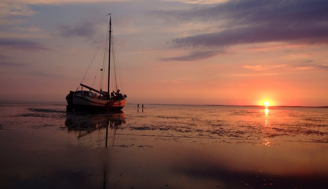 Wadden sea evening sailing trip sunset