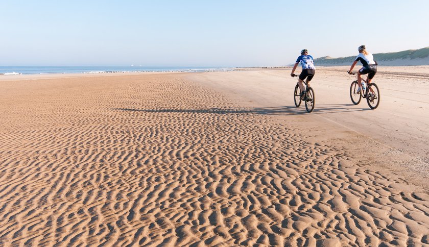 Cyclists on the beach between Schoorl and Bergen