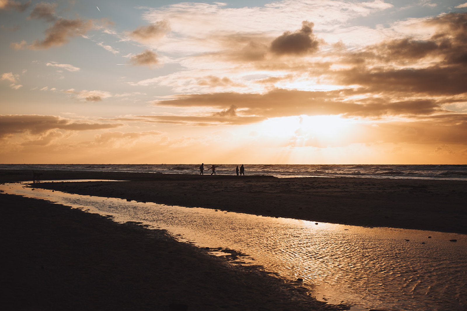 Wadden Islands sunset on the beach with people