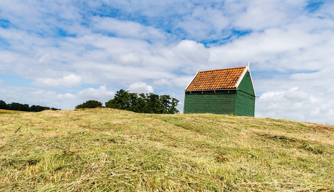 Wooden, green house on Schokland, Flevoland 