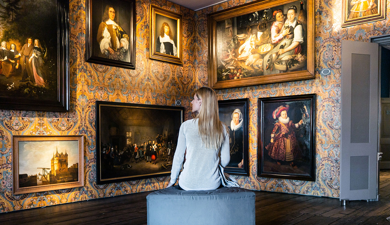 Lady on bench in Westfries museum in Hoorn