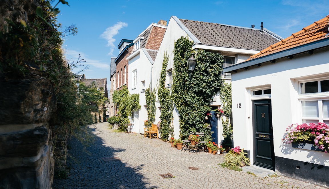 Maastricht attractive street with city wall and houses