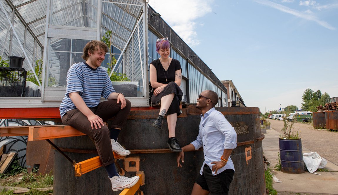 Young people at a greenhouse at the Keilewerf Rotterdam