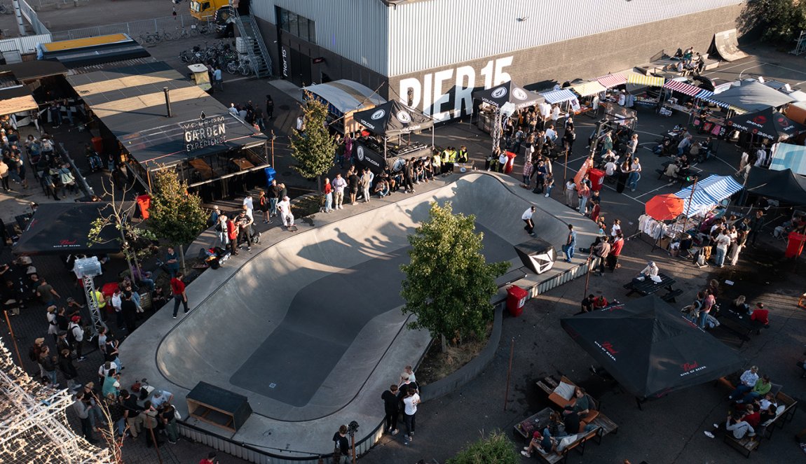 People at a skate rink on pier 15 in Breda