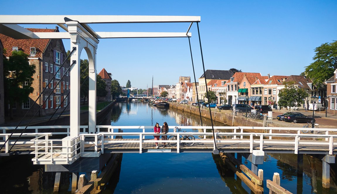 Hanseatic city of Zwolle ladies on Pelserbrug over Thorbeckegracht